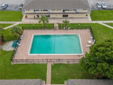 View of swimming pool with a lawn and a patio area