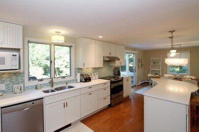 Stainless appliance and wood floors