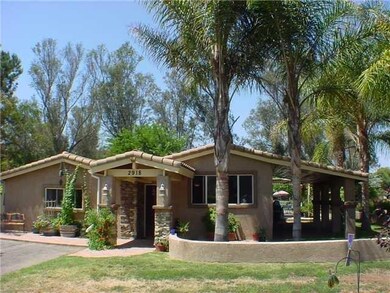 The complete exterior was updated in recent years with ledger stone, architectural details, new stucco and tile roof.