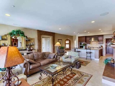 Another view of the family room and kitchen byond.