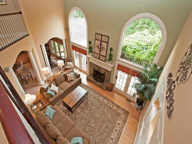 FAMILY ROOM WITH FRENCH DOORS AND LARGE WINDOWS BR