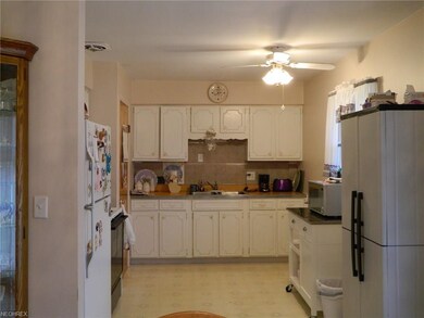 Kitchen w/vinyl floor & includes all appliances