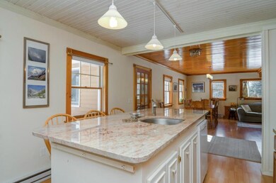 Open concept kitchen and dining room.