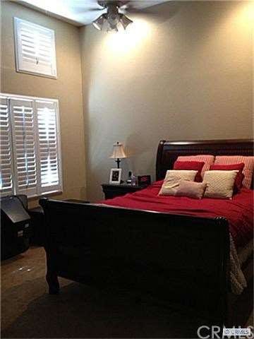 Large Master with vaulted ceiling & fan