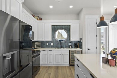 Kitchen offers a unique circular window above the