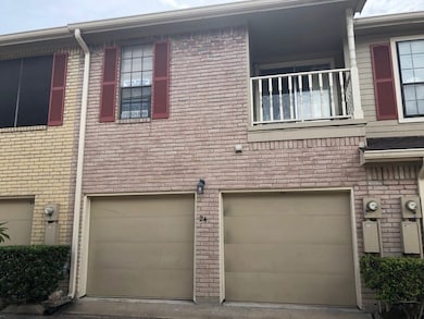 The extra wide concrete driveway provides easy access to the two attached garages with this unit. This unit comes with a full sized washer and dryer which is located in the over-size attached garage within easy access
from the main house.  There is twice a week,private trash pick-up at the garage doors. Notice the covered balcony off the master bedroom. This is a great place for taking a morning coffee or enjoying an afternoon libation.