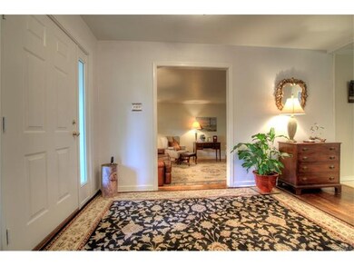 Bright, airy entrance foyer with new front door an