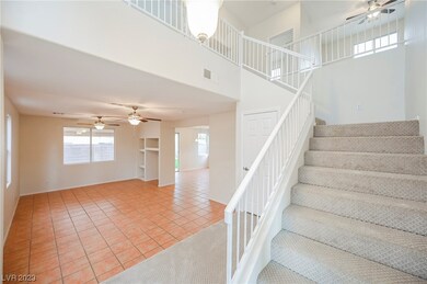 SPACIOUS living room with two ceiling fans!