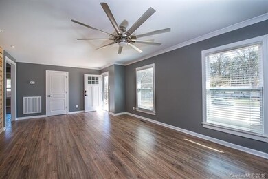 Large windows allow lots of sunlight, new Pergo fl