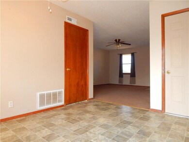 Dining area looking into the living room