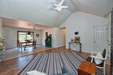 The new energy efficient door leading to he deck has built in adjustable blinds.