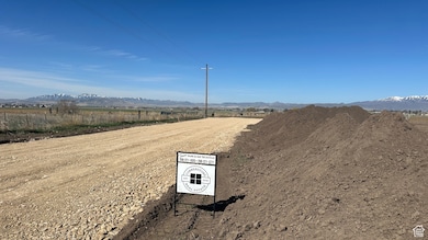 View of street with a rural view and a mountain view