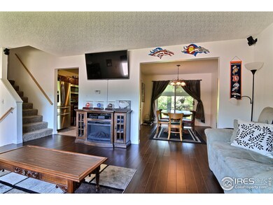 Living Room Opens To Dining Room