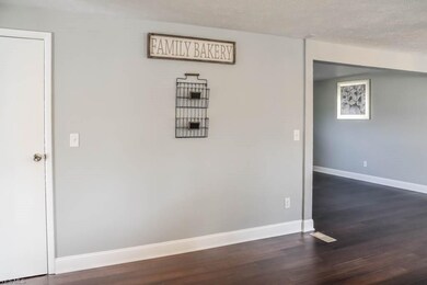 The entire first floor has new wood-look flooring, fresh paint, and a great open flow.