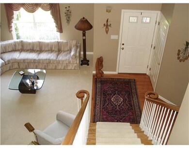Living Room. A view from the loft shows the spacio