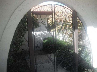 Entrance into the courtyard to front door.