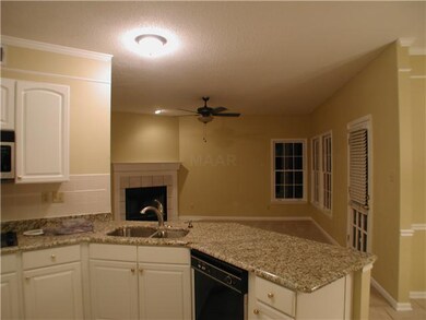 Granite Counter Tops, Tile Floors, Double Oven.