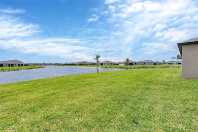 View of yard with a water view and a residential v