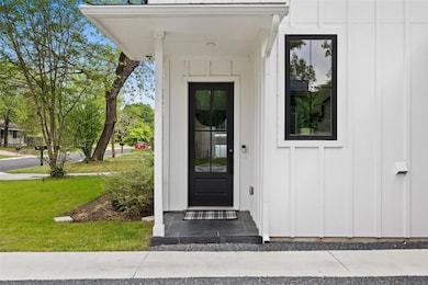 Entrance to property featuring board and batten s