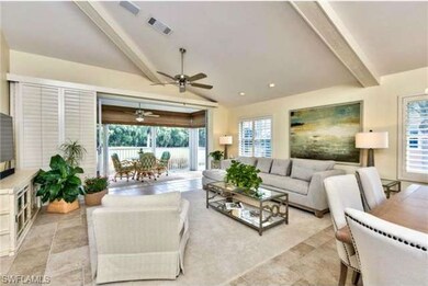 Living Room with wood beam ceiling