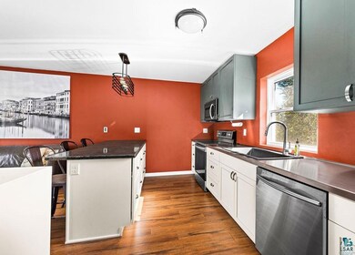 Kitchen featuring appliances with stainless steel 