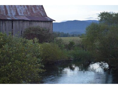Camp Creek borders farm