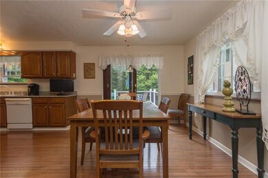 STEP UP TO LEVEL WHERE KITCHEN/DINING/LIVING ROOM 