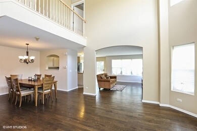 ...with a view of the Dining Room, Kitchen, Living