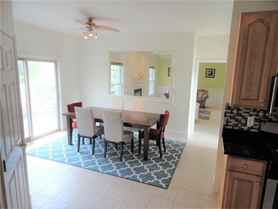 A view of the eat in area of the kitchen with open