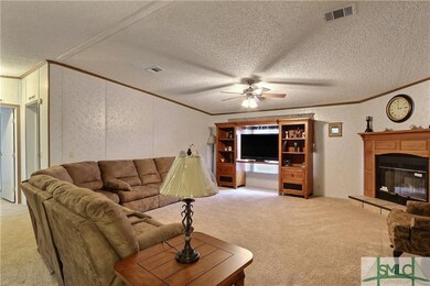 Great room with wood burning fireplace and like-ne