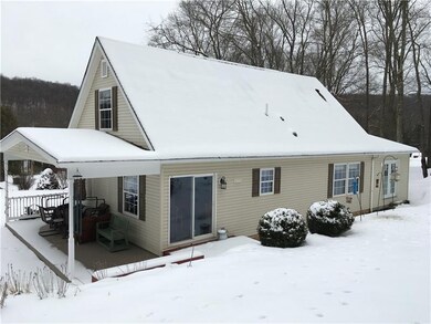 Back View of Home.  Additon has French Doors but i