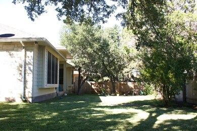View of fenced backyard