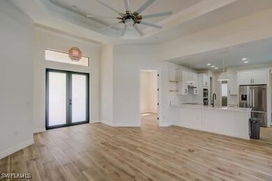 Unfurnished living room with light wood-type floor