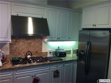 Stainless steel 5 burner GE Profile range with sta