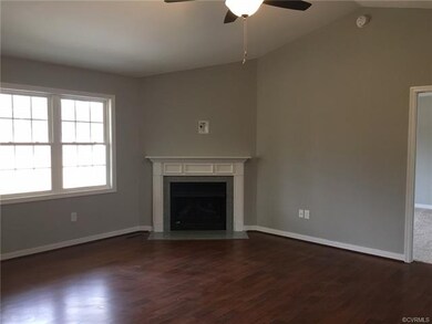 Great Room showing upgraded laminate floors, carpe
