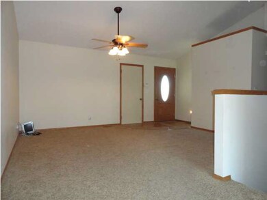 Large open livingroom with new lighting and paint 