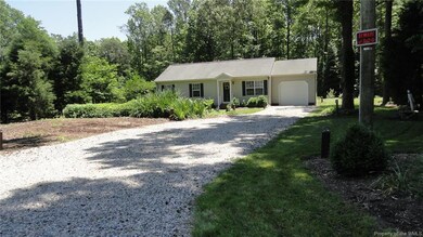 House sits back off of road on very private 3.59 acres.