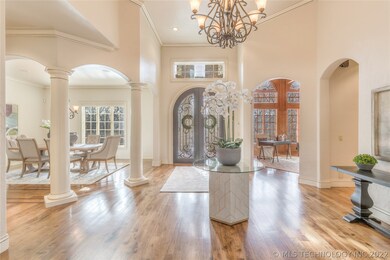 The beautiful foyer with high ceiling, gorgeous ha