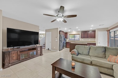Living area featuring recessed lighting, visible v