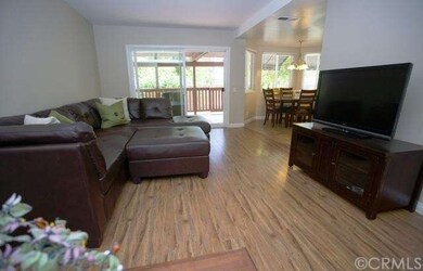 Family Room with Hardwood Floor off Kitchen