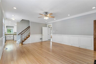 Family Room with rear staircase, trim work galore