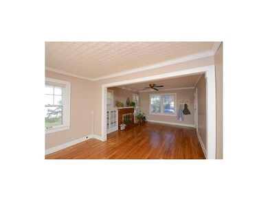 Adjoining dining room or extension of family room 
