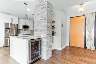 Kitchen with Beverage refrigerator