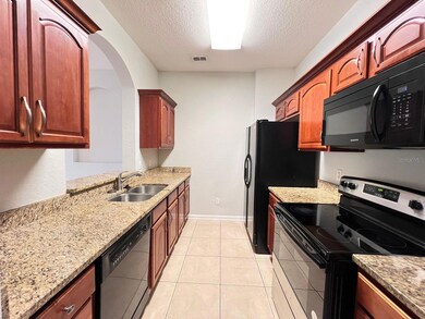 2484 San Tecla St unit 408, Orlando, FL 32835 - photo 6