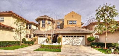 Beautiful curb appeal!  Manicured landscape, and s