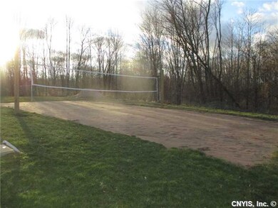 Backyard. The kids will love the volley ball court