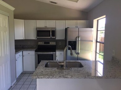 1458 SW KaMcHatka Ave, Port Saint Lucie, FL 34953 - photo 6