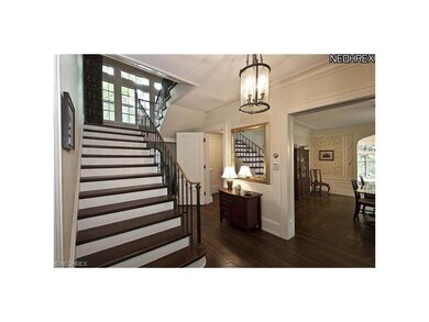 Majestic entrance with hardwood floor and lovely s