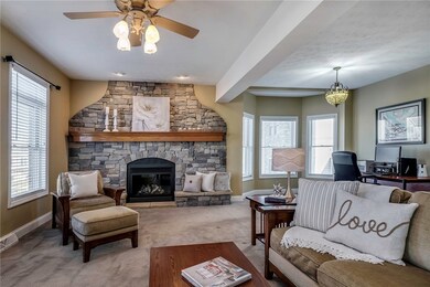 Spacious living room with cozy floor to ceiling st