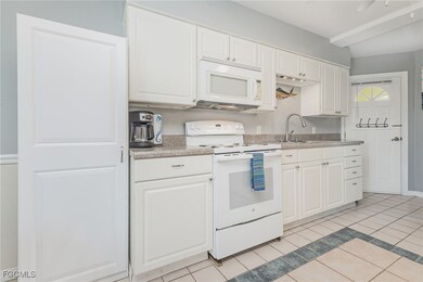 3211 Stringfellow Rd unit 104, Saint James City, FL 33956 - photo 5